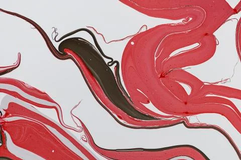 Abstract multicolored liquid solution surface macro close up from above Stock Photos