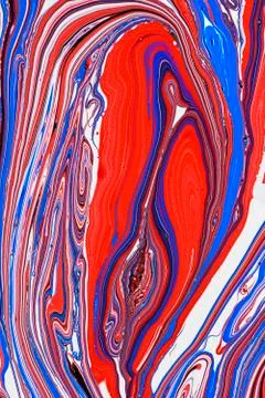 Abstract multicolored liquid solution surface macro close up from above Stock Photos