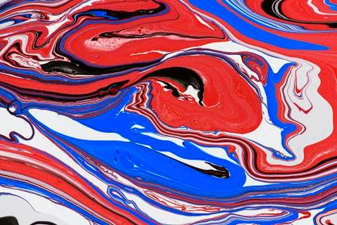 Abstract multicolored liquid solution surface macro close up from above Stock Photos