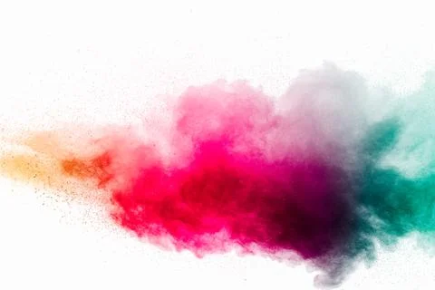 Abstract multicolored powder explosion on white background.Colorful dust. Stock Photos