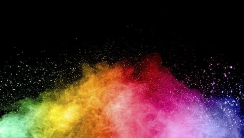 Abstract multicolored powder explosion on white background.Colorful dust Stock Photos