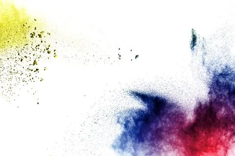 Abstract multicolored powder splatted on white background. Stock Photos