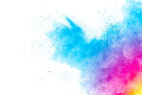 Abstract multicolored powder splatted on white background. Stock Photos