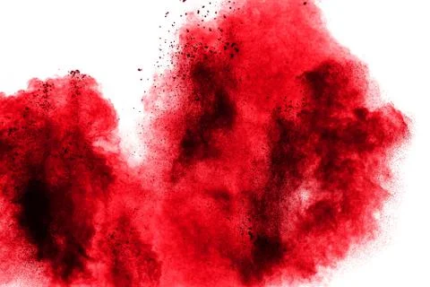 Abstract multicolored powder splatted on white background. Stock Photos