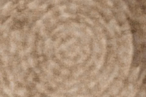 Abstract multiple expanding circles in brown tones. Illustrazione stock