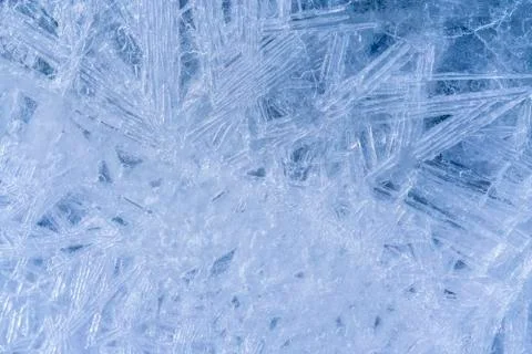 Abstract natural background - ice pattern on a water surface. Stock Photos