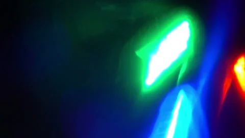 Abstract neon light trails in motion. Dynamic glowing bokeh background with vibr Video stock 340450227