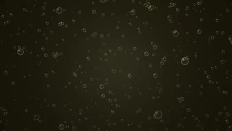 Abstract Neon Yellow Bubbles Floating on Dark Background Loop Stock Footage 346570977