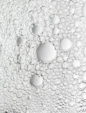 Abstract neutral background from numerous bubbles in water. Stock Photos
