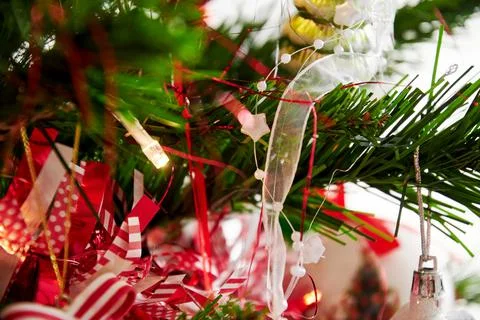 Abstract New Year tree background with ribbons, garland and shiny lights Stock Photos