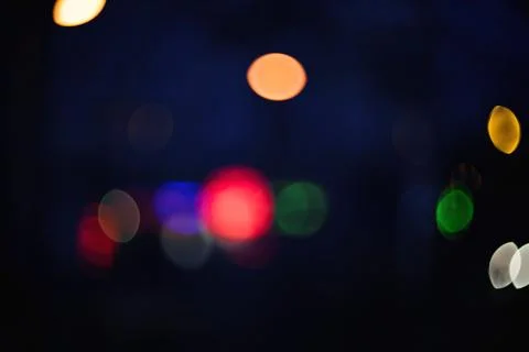 Abstract night bokeh background with glowing colorful blurred lights in the.. Stock Photos