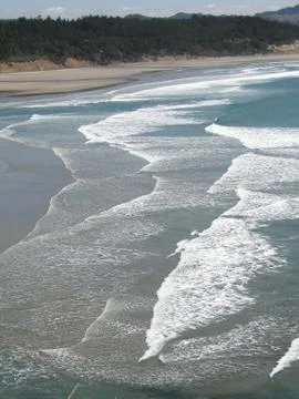 Abstract, ocean waves roll in.. Stock Photos