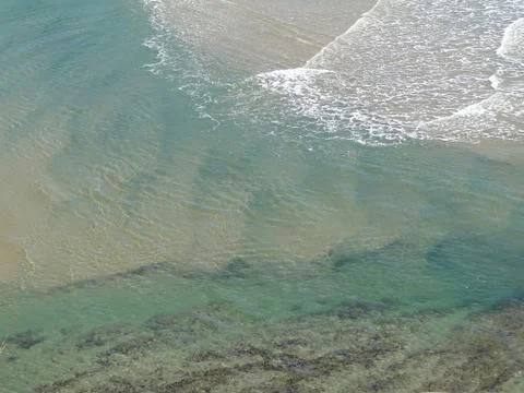 Abstract, ocean waves roll in.. Stock Photos