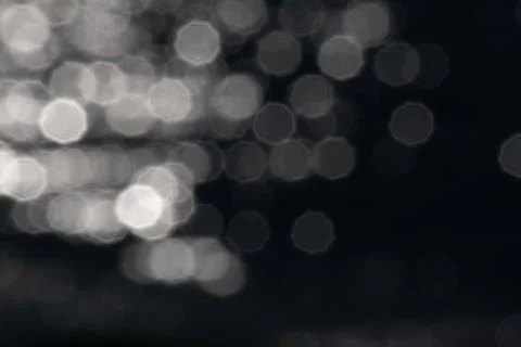 Abstract octagonal bokeh lights calming water reflections graphic resource Stock Photos