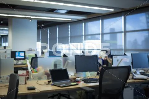 Abstract office with computer blur background Stock Photos