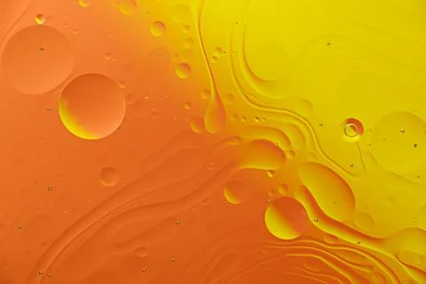 Abstract orange background with bubbles and smears Stock Photos