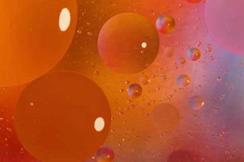 Abstract orange background with bubbles in the water Stock Photos