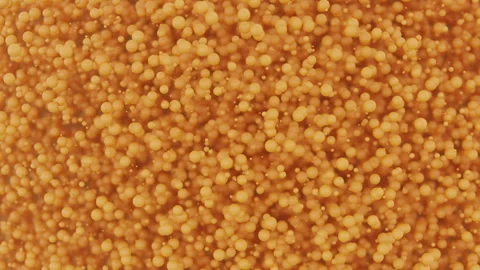 Abstract Orange Balls Spheres Background - Atoms Molecules - Seamless Loop Stock Footage 247882615