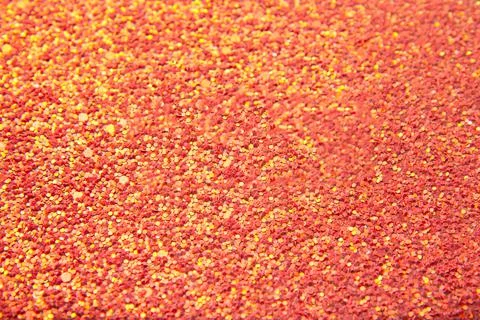 Abstract orange bright background with multicolored sparkles Stock Photos