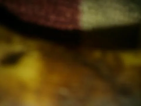 Abstract orange dark wallpaper with different elements in blurry effect with  写真素材