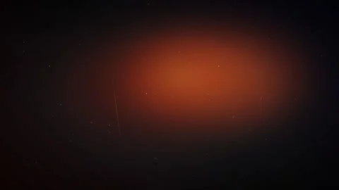 Abstract Orange Light Pulsating on Dark Background with Pixelated Effect Stock Footage 336617596