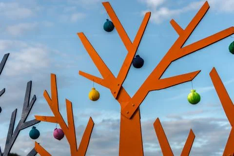 Abstract orange tree on a background of blue sky Stock Photos
