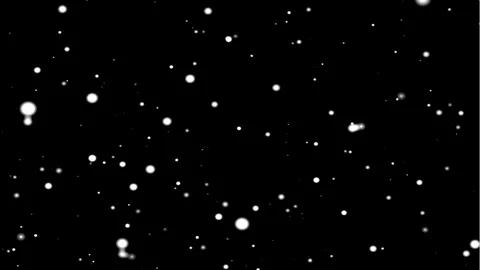 Abstract organic particles floating gently against a dark background with s.. Stock Footage 346532516