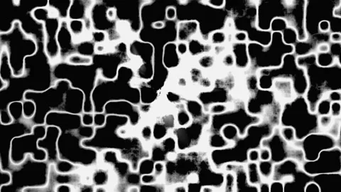 Abstract organic patterns emerge and dissolve with cinematic motion during .. Stock Footage 341652409