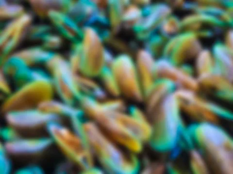 An abstract, out-of-focus background shot showing vibrant green, yellow, an.. Stock Photos