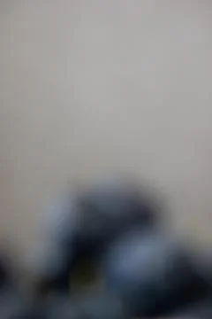 Abstract out of focus blurred background with dark blue shapes Stock Photos