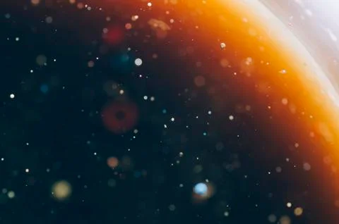 Abstract outer space concept colorful liquids on water dark background Foto stock