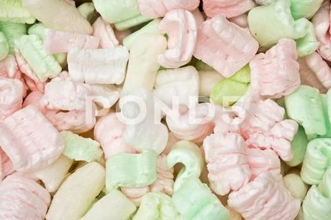 Abstract Packing Peanut Foam on Black Background Stock Photos