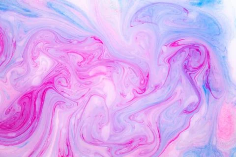 Abstract paint ink, psychedelic background. Colorful spots on water surface. Stock Photos