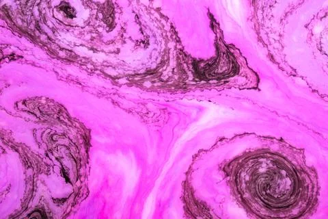 Abstract paint ink, psychedelic background. Colorful spots on water surface. Stock Photos