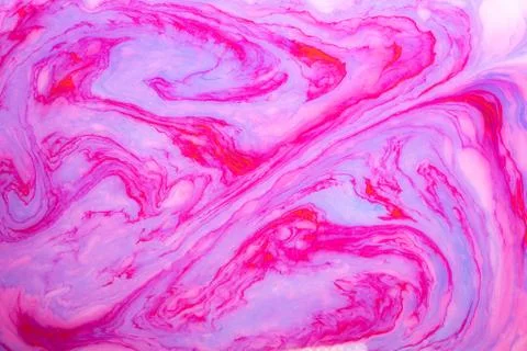 Abstract paint ink, psychedelic background. Colorful spots on water surface. Stock Photos