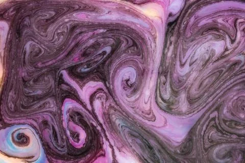 Abstract paint ink, psychedelic background. Colorful spots on water surface. Stock Photos