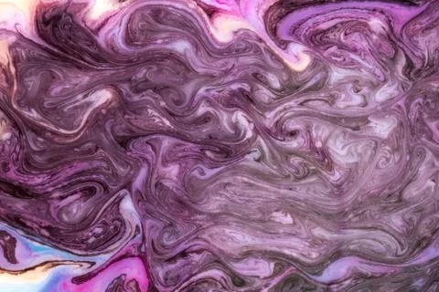 Abstract paint ink, psychedelic background. Colorful spots on water surface. Stock Photos