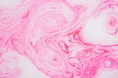 Abstract paint ink, psychedelic background. Colorful spots on water surface. Stock Photos
