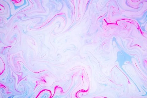 Abstract paint ink, psychedelic background. Colorful spots on water surface. Stock Photos