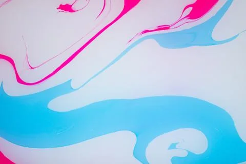 Abstract paint ink, psychedelic background. Colorful spots on water surface. Stock Photos