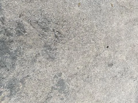 Abstract paint pattern on a dark and beautiful stone wall. Stock Photos