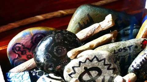 Abstract painted Viking drawing patterned spiritual pebbles colourful Stock Footage 158932632