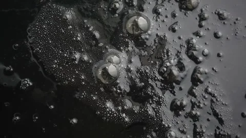 Abstract particle motion with flowing metallic texture. Dynamic seamless loop of Видео 340456706