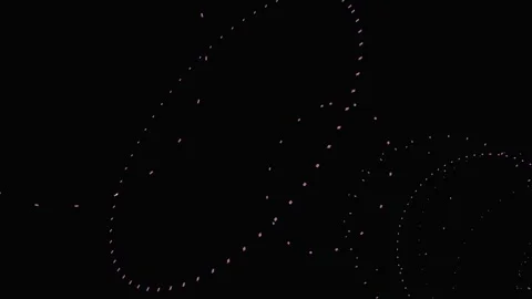 Abstract particle trails in slow motion against black background with cinem.. Stock Footage 340939724