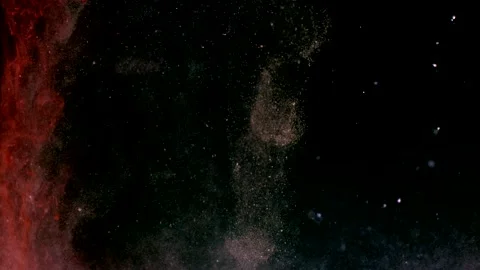 Abstract particles in multicolor liquid flow and float motion on black Stock Footage 138595040