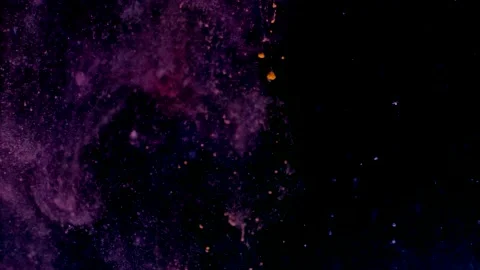Abstract particles of purple liquid flow and float motion on black Stock Footage 138593290