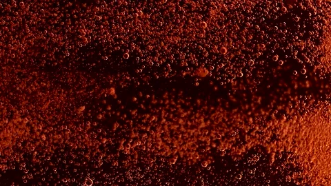 Abstract particles of red and orange liquid flow and float motion on black Stock Footage 138593051