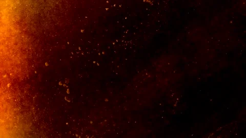 Abstract particles of red and orange liquid flow and float motion on black Stock Footage 138593221
