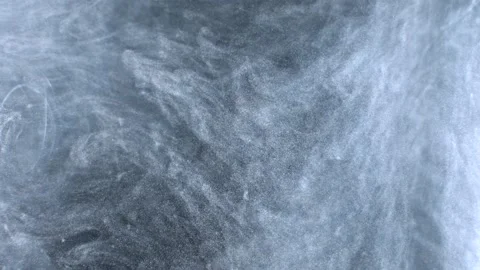 Abstract particles of silver liquid flow and float motion on black Stock Footage 138593021