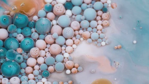 Abstract pastel colors bubbles paint. Slow motion. Top view Vídeo Stock 105174413